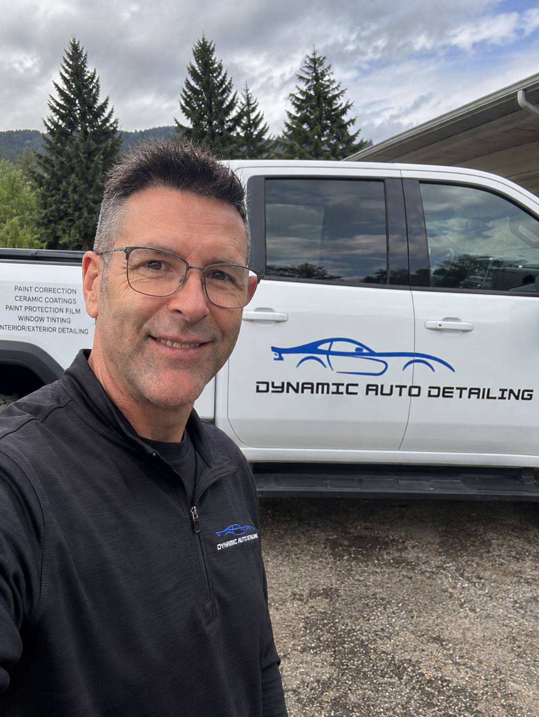 Peter, founder of Dynamic Auto Detailing, beside the company service vehicle